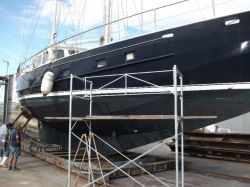 Boat in dry dock/on slipway for sandblasting 